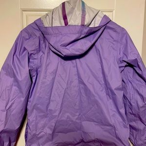 Like New.  Purple North Face Rain Jacket